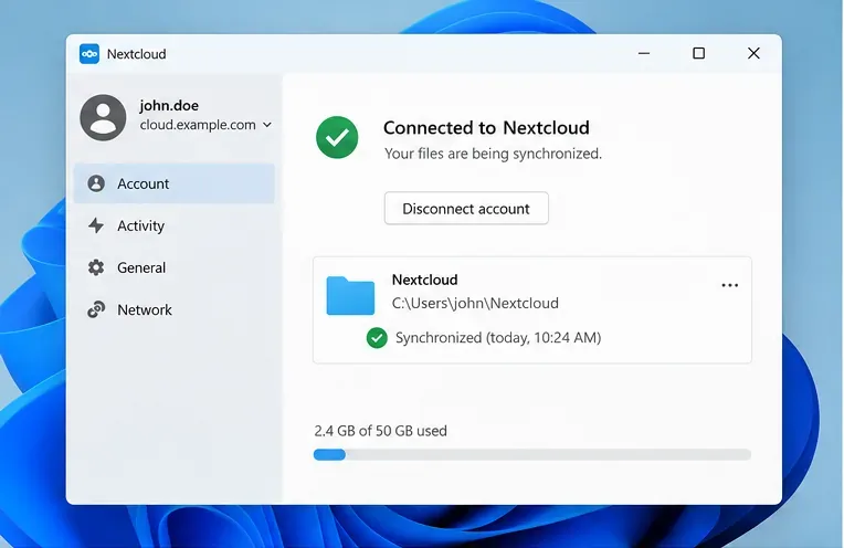 接続されたアカウントと同期されたローカルのNextcloudフォルダを示す、Nextcloudデスクトップクライアントのウィンドウの例。