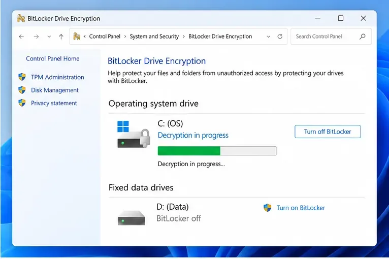 ภาพประกอบแผงควบคุม BitLocker แสดงไดรฟ์ C: ของ Windows พร้อมสถานะ "กำลังถอดรหัส" และแถบแสดงความคืบหน้า
