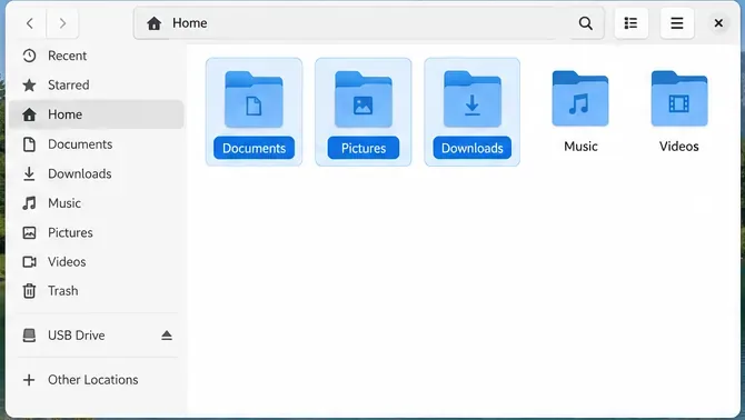 デスクトップファイルマネージャーで、「ドキュメント」「画像」「ダウンロード」が選択され、サイドバーにUSBドライブが表示されている。