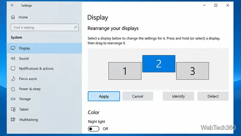 Ustawienia wyświetlania systemu Windows 10 z trzema prostokątami monitora ułożonymi na różnych wysokościach