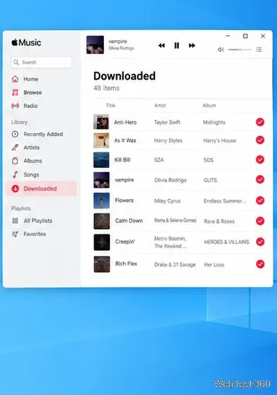 Vue des titres téléchargés sur Apple Music avec des indicateurs de téléchargement à côté de plusieurs chansons