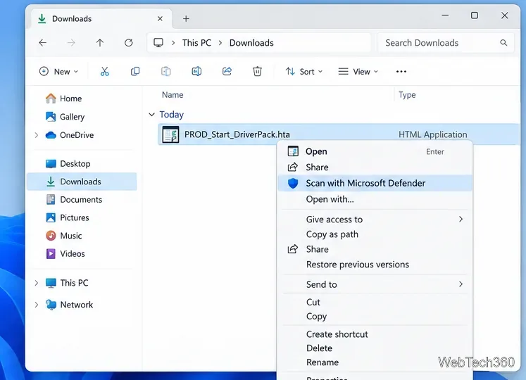Windows Downloads folder with a DriverPack HTA launcher and Scan with Microsoft Defender selected
