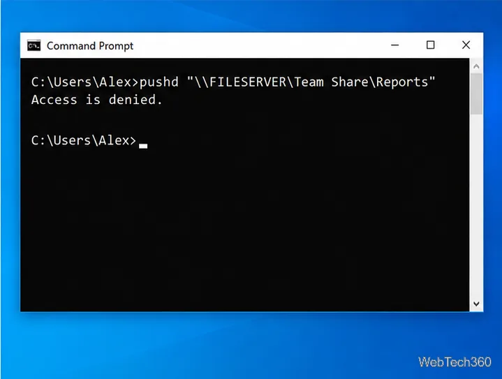 Command Prompt showing the example pushd command followed by an Access is denied message