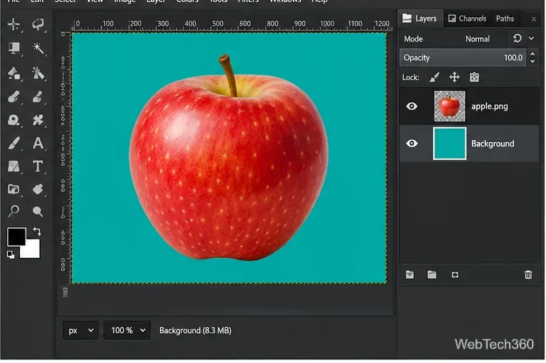Uma maçã vermelha em PNG sobre uma camada de fundo verde-azulado no GIMP, com o verde-azulado visível ao redor da maçã.