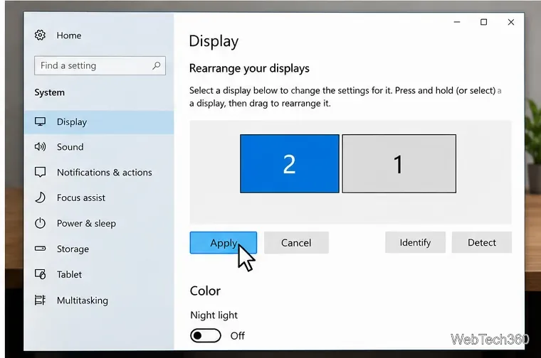 Windows 10 Display settings showing monitor 2 placed left of monitor 1 and the Apply button