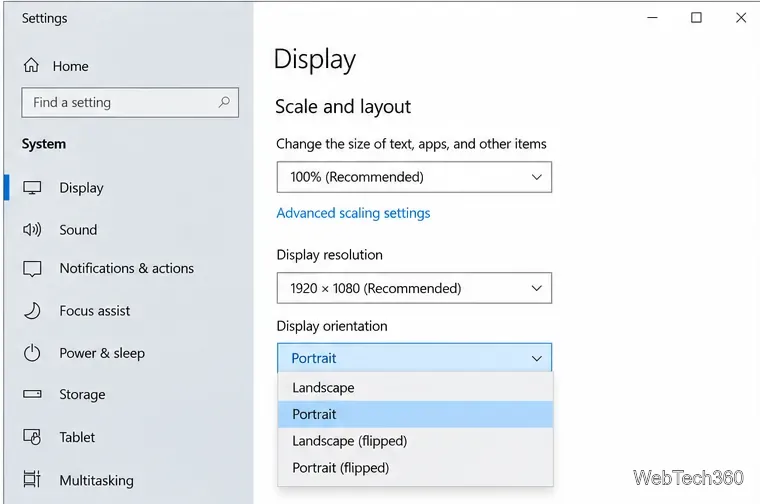 Windows 10 Scale and layout settings showing recommended resolution and portrait orientation options