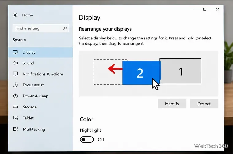 Windows 10 Display settings with monitor 2 being dragged to the left of monitor 1