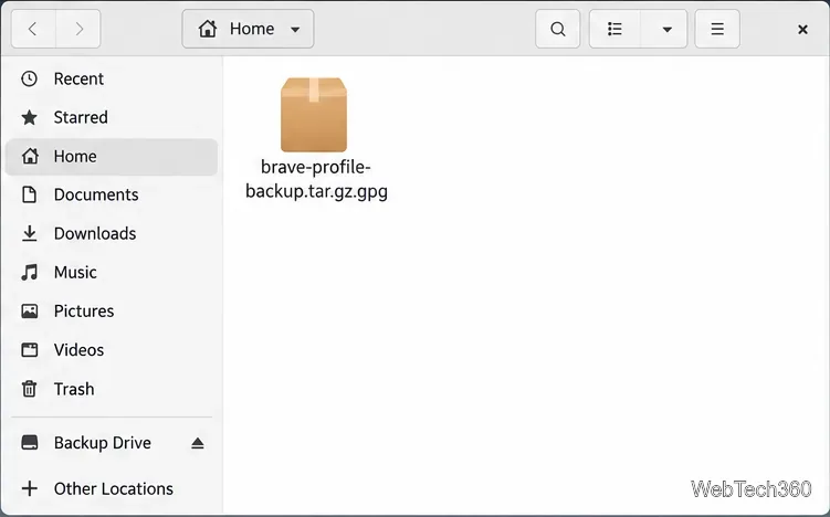 A Linux file manager showing brave-profile-backup.tar.gz.gpg and an external Backup Drive.