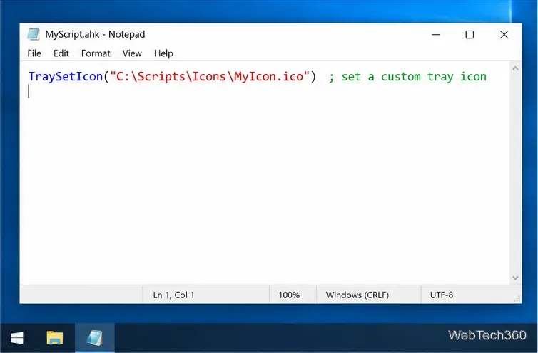 O fereastră Notepad care afișează comanda AutoHotkey v2 TraySetIcon cu o cale completă către MyIcon.ico