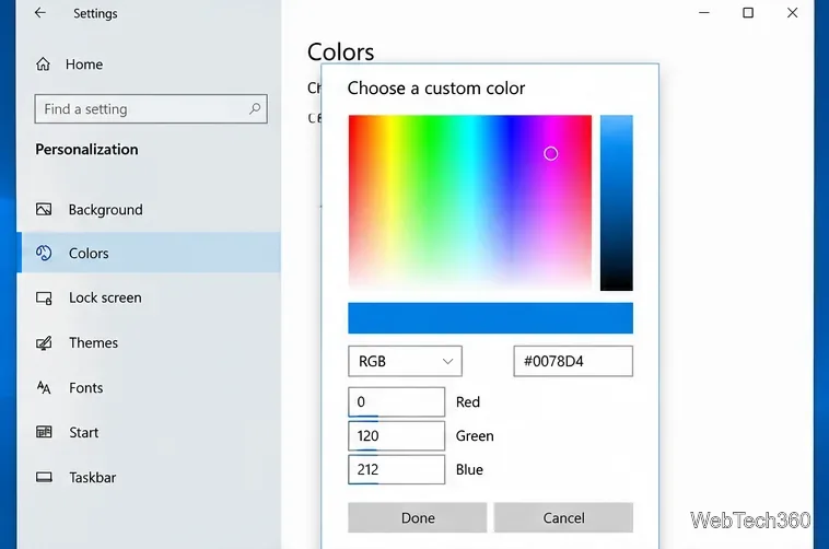 مربع حوار تخصيص الألوان في ويندوز 10 مع طيف ألوان وحقول RGB وزر "تم".