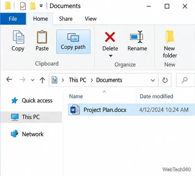 Panglica principală din Explorerul de fișiere Windows 10 cu butonul Copiere cale deasupra unui fișier selectat.