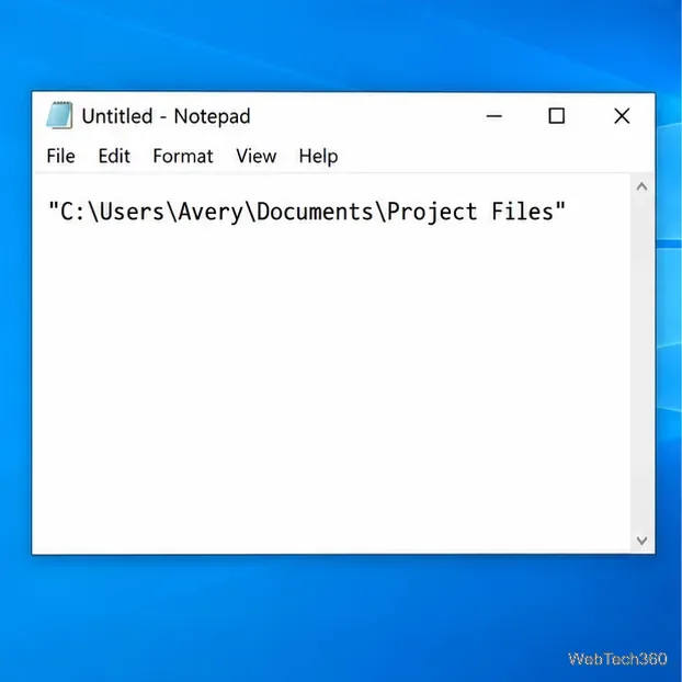 Notepad care afișează calea între citate către folderul Project Files.