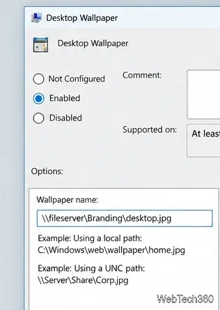 Close-up illustration of the Desktop Wallpaper policy properties with Enabled selected and a UNC image path entered.