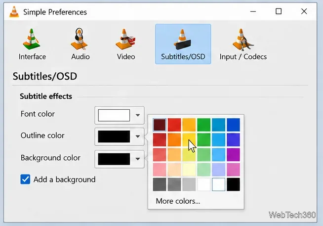 Seletores de cores para texto de legenda, contorno e fundo, ao lado de uma paleta de cores.