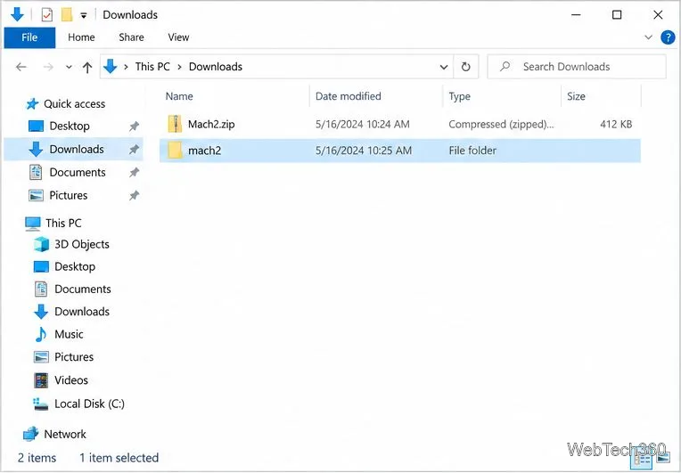 В проводнике Windows отображается папка «Загрузки», содержащая файл mach2.zip и извлеченную из него папку mach2.