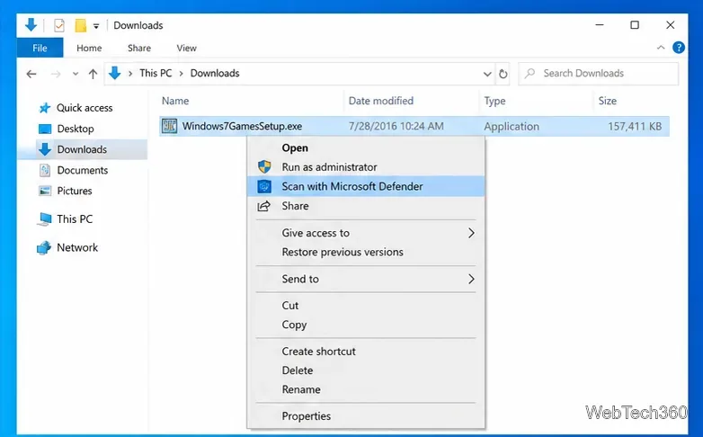 Menu kontekstowe Eksploratora plików Windows z opcją Skanuj za pomocą programu Microsoft Defender wybraną dla pobranego pliku instalacyjnego.
