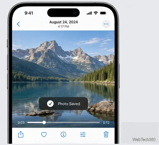 A paused Photos video with a confirmation message indicating that the photo was saved.