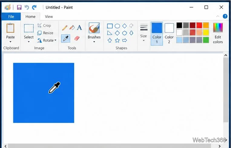 O cursor conta-gotas do Paint amostrando o centro de um quadrado azul sólido.