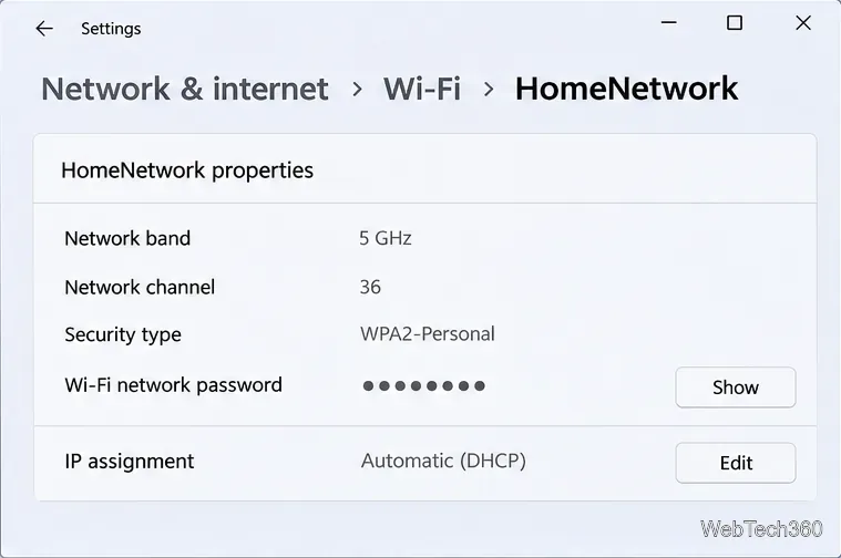 Tela de propriedades da rede Wi-Fi do Windows 11 mostrando a linha da senha da rede Wi-Fi e o botão Mostrar.