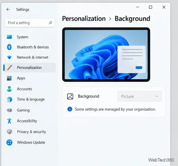 Page d'arrière-plan de personnalisation Windows avec son sélecteur désactivé et un message indiquant que certains paramètres sont gérés par l'organisation.
