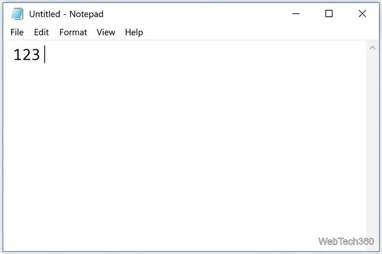 Notatnik systemu Windows 10 wyświetla liczbę 123 jako prosty test wprowadzania danych za pomocą klawiatury numerycznej.