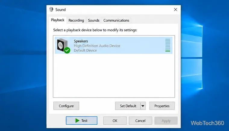 Windows Sound dialog on the Playback tab with Speakers selected and the Test button visible