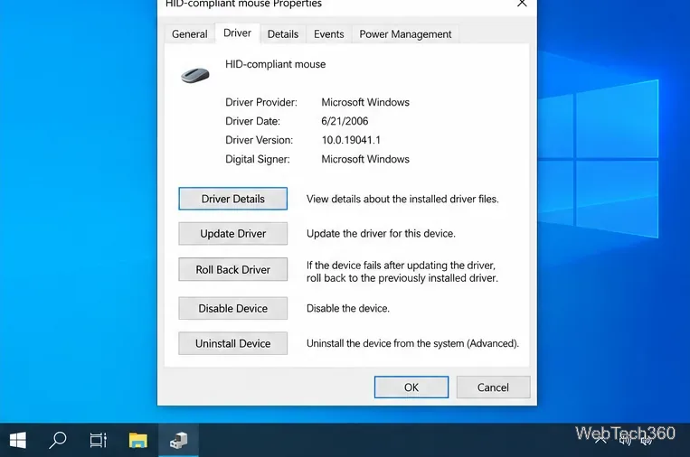 Mouse Properties Driver tab in Windows showing the Roll Back Driver control.