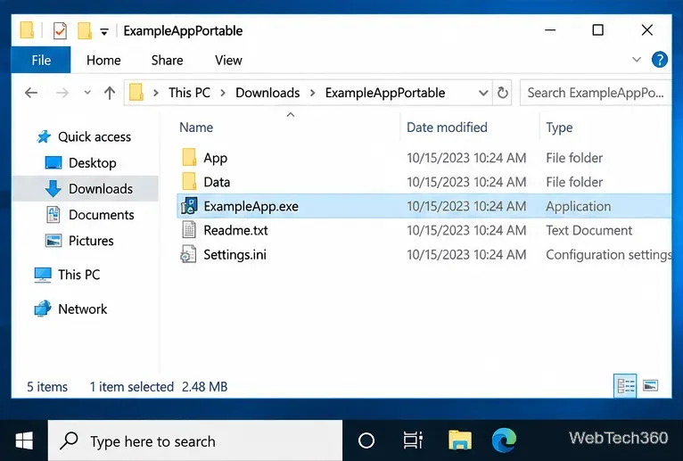 Иллюстрация проводника Windows 10, показывающая исполняемый файл портативного приложения в папке «Загрузки».
