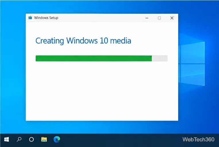 Программа установки Windows создает установочный носитель Windows 10, при этом отображается зеленая полоса прогресса.