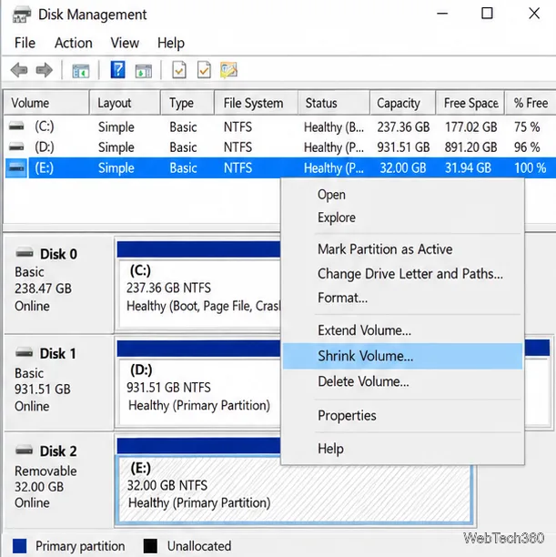 The USB volume is selected in Disk Management, with Shrink Volume highlighted in its context menu.