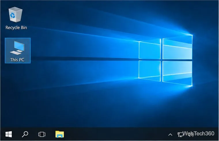 Bureau Windows 10 affichant la Corbeille et Ce PC sans cases à cocher.