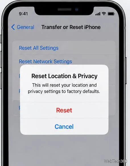 O alertă de confirmare pe iPhone pentru Resetarea locației și a confidențialității cu acțiunile de Resetare și Anulare.