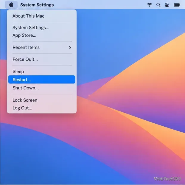Le menu Apple sur un Mac avec l'option Redémarrer sélectionnée.