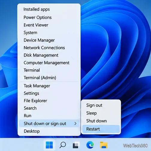 Menu Windows 11 com o ícone "Windows + X", com as opções "Desligar ou encerrar sessão" expandida e "Reiniciar" selecionada.