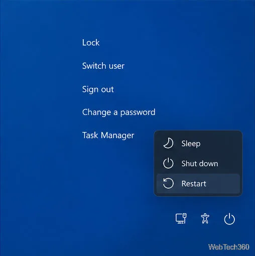 A tela de segurança Ctrl+Alt+Delete tem o menu de energia aberto no canto inferior direito, com a opção Reiniciar selecionada.