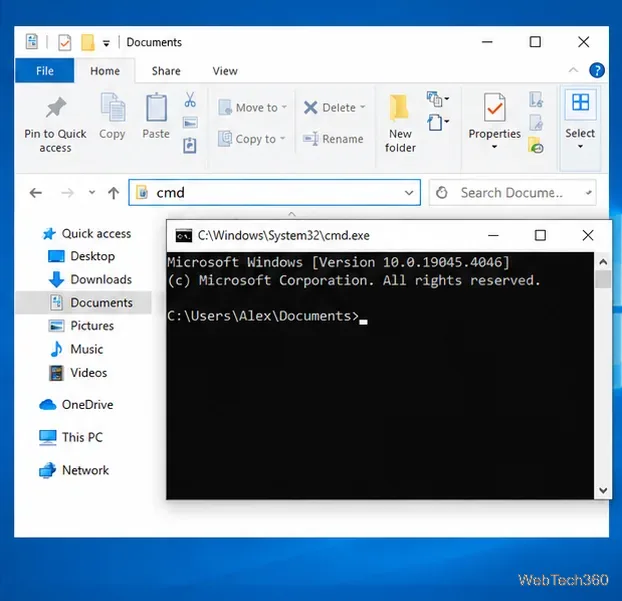 شريط عناوين مستكشف الملفات في نظام التشغيل Windows 10 يعرض cmd ونافذة موجه الأوامر مفتوحة في المستندات