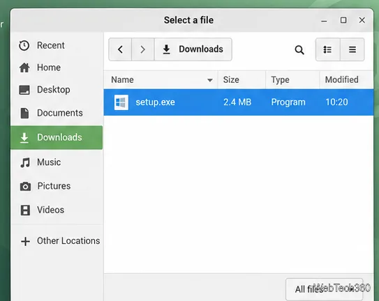 Exemplu de selector de fișiere cu un fișier setup.exe Windows selectat din Descărcări; utilizați un program de instalare de la editorul de software.
