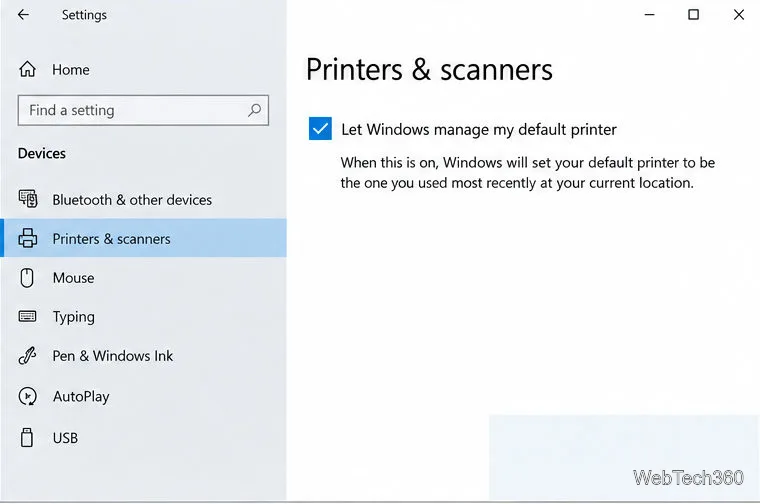 A opção "Permitir que o Windows gerencie minha impressora padrão" está marcada.