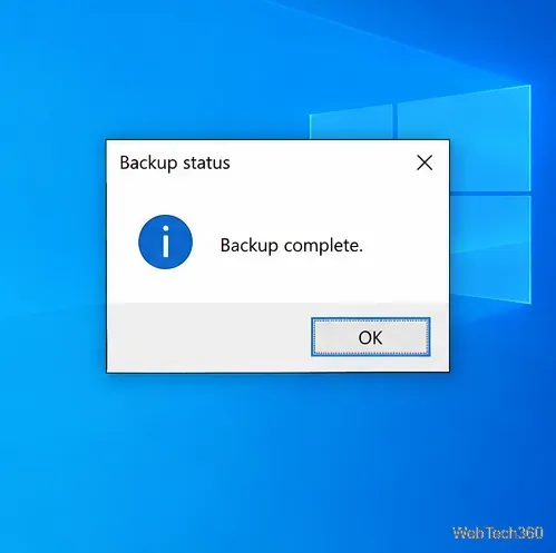 A Windows information dialog displaying Backup complete under the title Backup status.