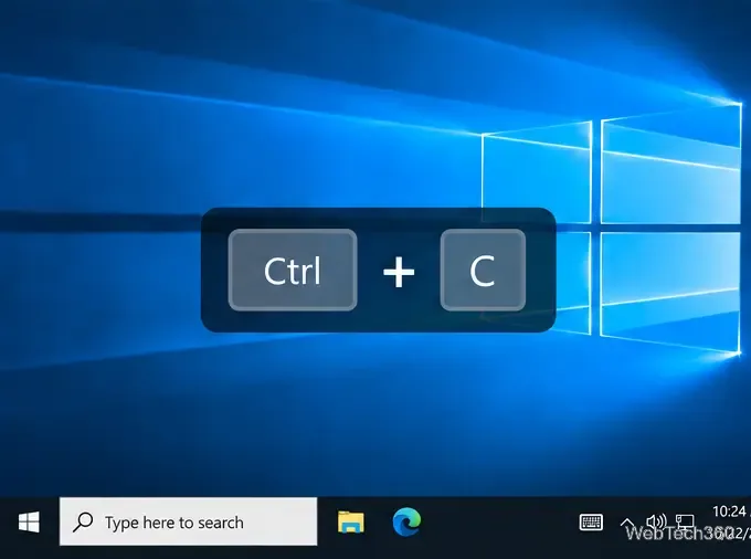 O fereastră pop-up translucidă Carnac care afișează Ctrl plus C pe desktopul Windows 10.