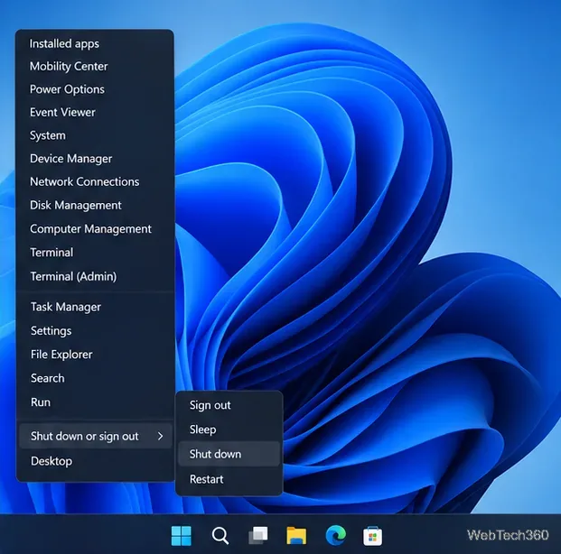 Menu de contexto do botão Iniciar do Windows 11 com a opção Desligar ou sair expandida para exibir Desligar.