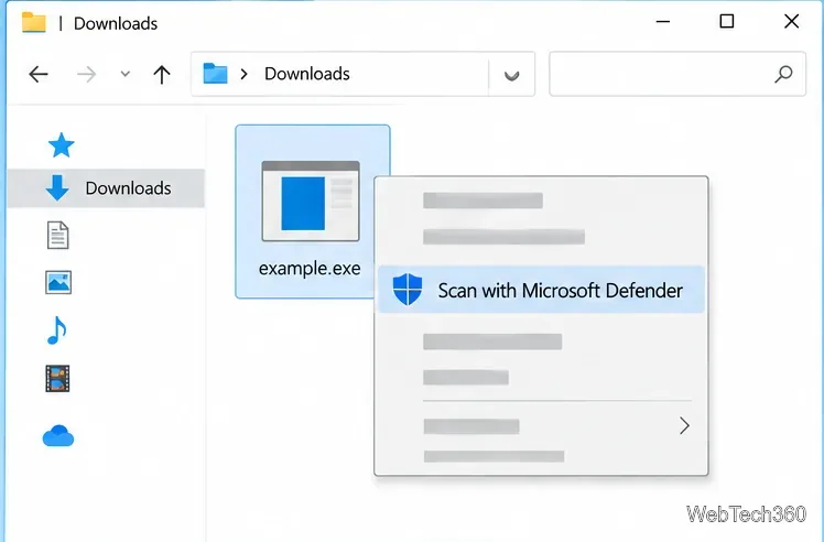 Le dossier Téléchargements avec un fichier EXE sélectionné et l'option « Analyser avec Microsoft Defender » mise en surbrillance.