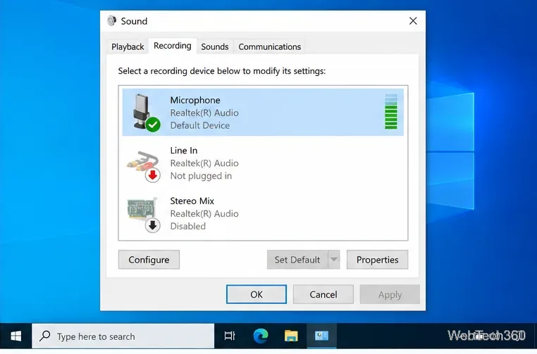 Windows 10 Sound control panel Recording tab with a microphone selected and a green input level meter
