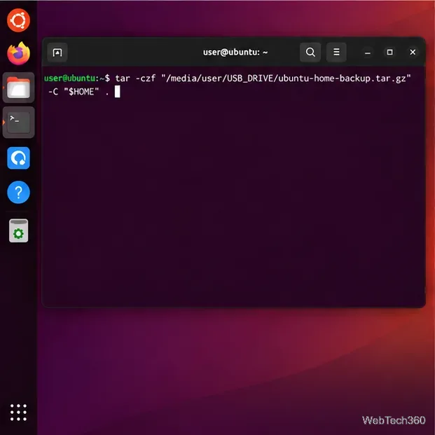Ubuntu Terminal displays the tar command that compresses the current Home folder onto a mounted USB drive