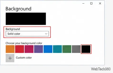 Настройки фона Windows 10, отображающие параметр «Сплошной цвет» и цветовую палитру.
