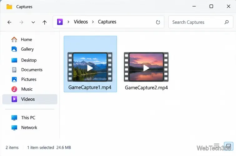 O Explorador de Arquivos está aberto na pasta Vídeos e Capturas, contendo duas gravações em MP4.