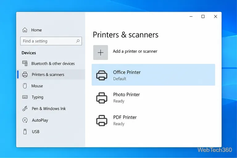 หน้า "เครื่องพิมพ์และสแกนเนอร์" ของ Windows 10 แสดงเครื่องพิมพ์เริ่มต้นหนึ่งเครื่องและรายการเครื่องพิมพ์อื่นๆ