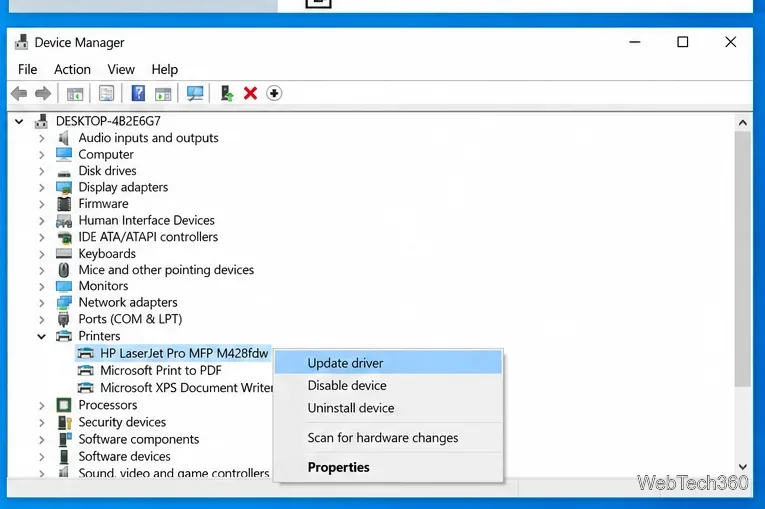 Windows 10 Device Manager with a printer selected and Update driver highlighted
