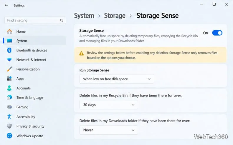 Configurações do Sensor de Armazenamento do Windows 11 com o recurso ativado, tempo de execução definido para quando o espaço em disco estiver baixo, limpeza da Lixeira após 30 dias e Downloads definidos como Nunca.