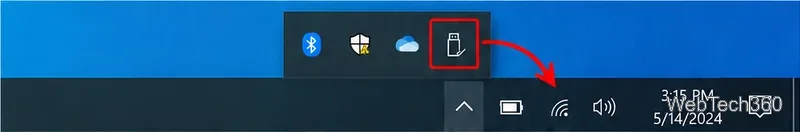 Das Symbol „Hardware sicher entfernen“ wird aus dem Bereich „Ausgeblendete Symbole“ von Windows 10 in Richtung Taskleiste gezogen.
